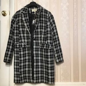 Black lined dress coat.  Never worn.